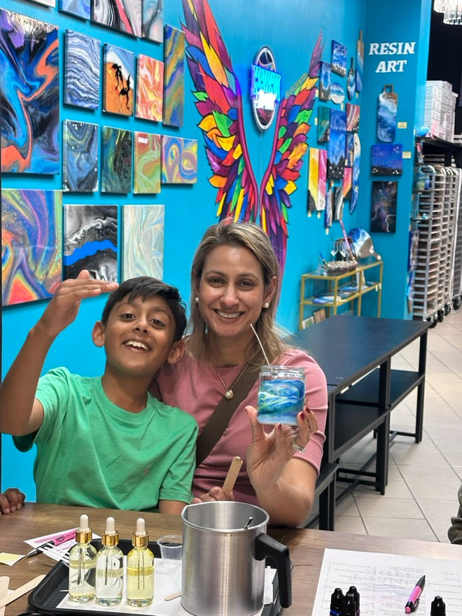 Friends at a candle making class in Pleasanton with the candles they made