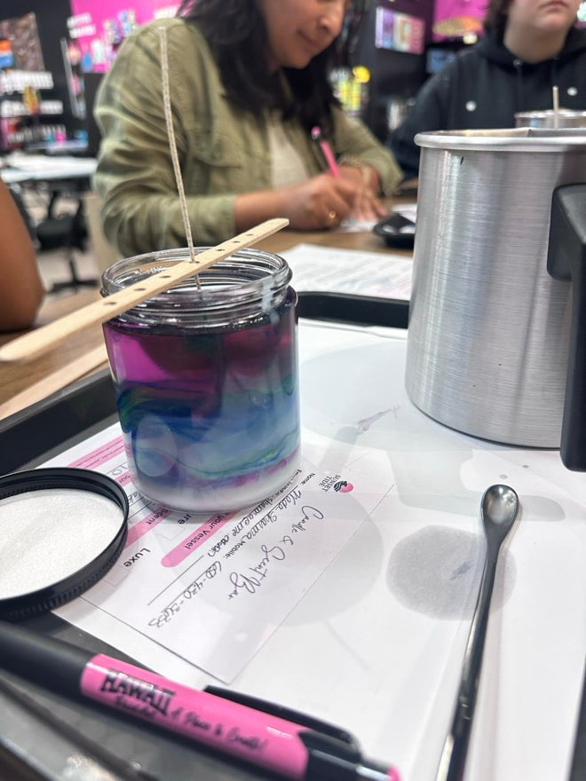 Layered blue and purple sand wax candle