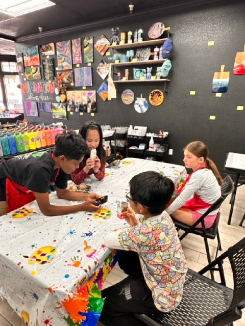 Campers enjoying their snack break at the studio
